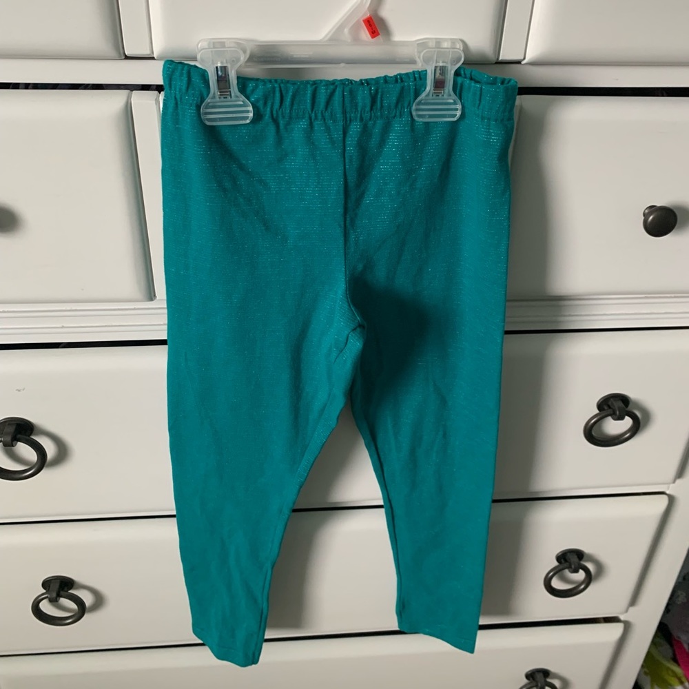 Size 8 green sparkling leggings!